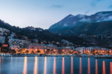 Cityscape of Menton at night, a historic town in the Provence-Alpes-C&ocirc;te d'Azur region on the French Riviera
