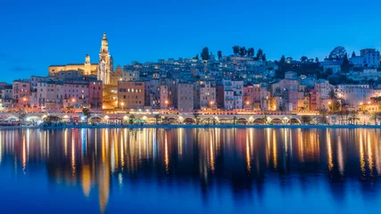 Poster Cityscape of Menton at night, a historic town in the Provence-Alpes-Côte d'Azur region on the French Riviera © Sen
