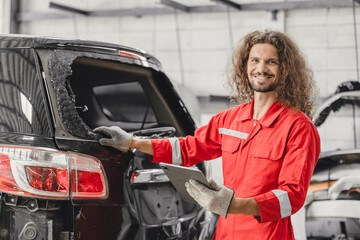 mechanic male happy smiling work insurance online claim accident car in garage auto workshop from...