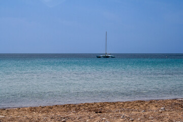 Lonely catamaran in a shore
