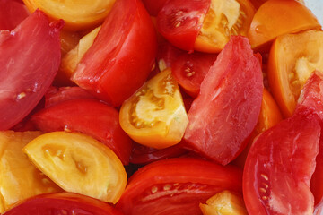 Sliced red and yellow tomatoes