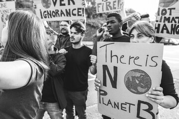 Multigenerational people protest against climate change - Activism and environmental concept -...