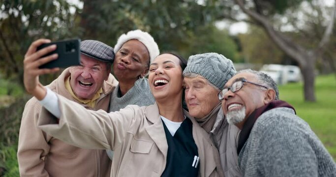 Caregiver, old people and selfie, funny face outdoor with elderly care and wellness, health and fresh air. Kiss expression, memory and social media, smile in picture with photography in nature