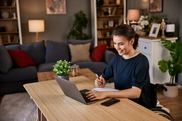 Wheelchair user thriving in remote work.