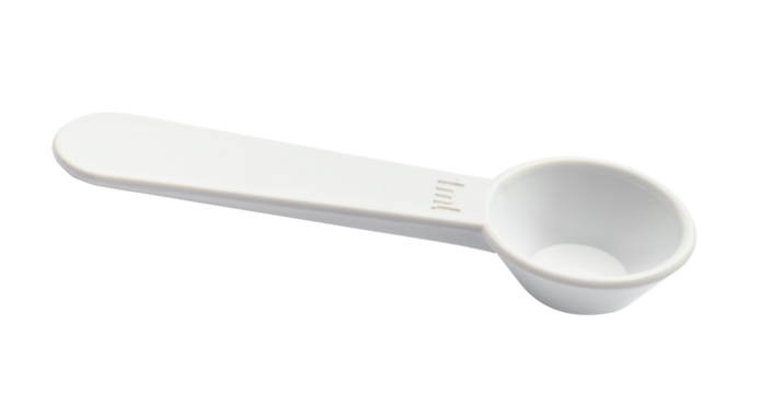white plastic measuring spoon for 1 ml of volume cutout on white background