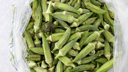 healthy and organic raw green okras.Food background