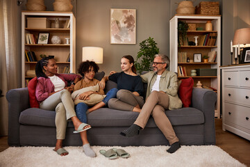 Portrait of a  happy diverse family at home.