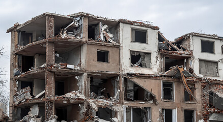 natural disaster earthquake in a destroyed city at day with rubble on the floor and walls