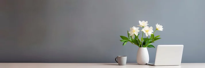 Selbstklebende Fototapeten Minimalistic office desk with a laptop and one flower on the table. Generative AI © Лилия Захарчук