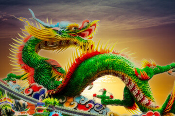 Fototapeta premium Close up of a dragon against the sky.