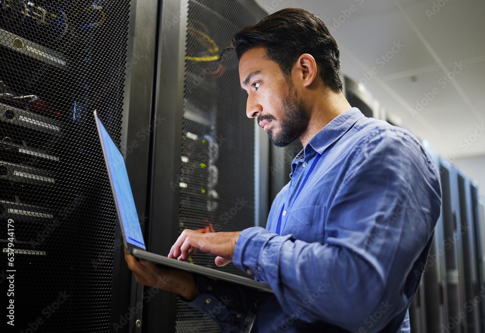 Aufkleber Connectivity, data center and a man with a laptop for maintenance, cyber security and internet check. Coding, email and an Asian programmer typing on a computer for network or server analytics
