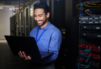 Man, server room and computer for happy programming, system solution and data center, coding or cybersecurity. Business person, laptop and engineering network, gdpr software and backup or maintenance