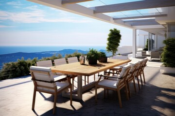 The terrace of a modern house and hotel. Luxury outdoor dining table with chairs