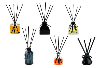 luxury aroma scent reed diffuser glass bottles are on the white background they are many colour , black , blue , yellow , orange and  red which creat relax aroma ambient in the room ( clipping path ) - obrazy, fototapety, plakaty