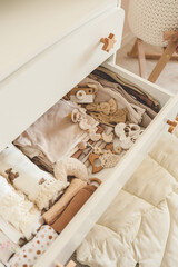 Open bedside table with things for newborns, concept in anticipation