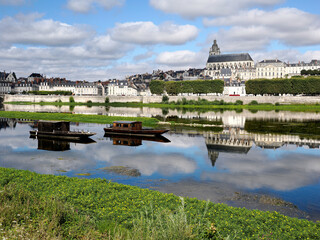 Edge of the Loire at and the cathedral Saint Louis with big reflection. Blois a commune and the capital city of Loir-et-Cher department in Centre-Val de Loire, France