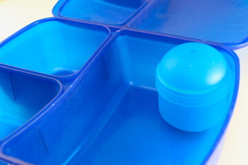 A photo of a student's blue lunchbox 