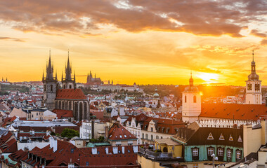 Aerial view of Prague cityscape during sunset. The Church of Our Lady before Tyn in the foreground.