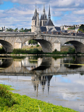 Bridge Jacques-Gabriel over the Loire river and Saint Nicholas church at Blois, a commune and the capital city of Loir-et-Cher department in Centre-Val de Loire, France