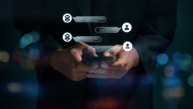 Business chatting a smart AI using an artificial intelligence chatbot developed with AI robot. automatically respond online messages intelligent service to help customers.