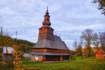 A Glimpse of History: Serene Wooden Church in a Picturesque Ukrainian Village