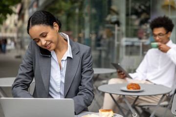 Colleagues working on project together and looking focused
