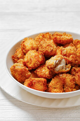 crispy fried panko breaded chicken bites in bowl