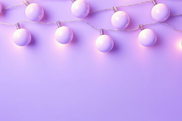 Christmas light garland on a lavender purple wall with copy space