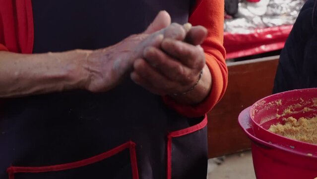 Traditional Mexican Cuisine: Latin Woman Crafting Tlayoyos in Zacatlan, Puebla