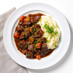 Fototapeta premium Beef Carbonade Belgian Dish On Plate On White Background Directly Above View