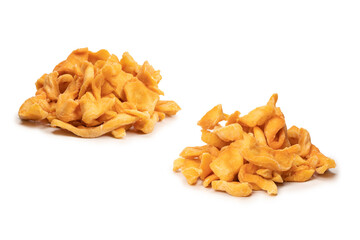 Dried melon slices isolated on a white background.