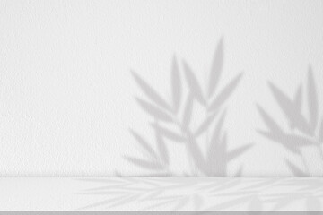 Studio background,concrete with Bamboo Leaves shadow with sunlight effect on white wall background,Empty Studio Room Display with leaves silhouette on Cement,Backdrop display for product presentation