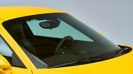 Windshield on a yellow car