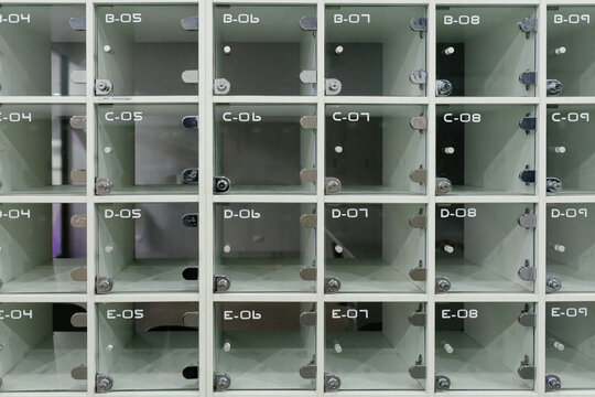 Clear acrylic locker box or locker in front of the classroom.