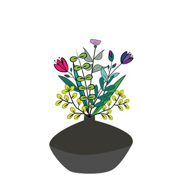 Florero negro con ramo de flores.