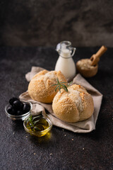 Fresh baked sourdough sesambrötchen bread buns with sesame seeds. Artisan bakery