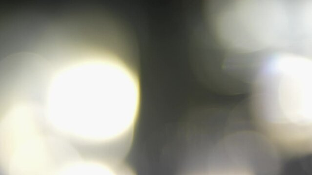 Abstraction symphony: The glow effect and the bokeh annotation intersect against the background of defocused frames, creating a deep transition. Glow Magic: Overlay and glow effects create an