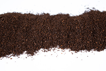 Pile of dark roast coffee grounds