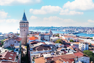 Galata Tower in Istanbul, Turkey. Aerial view of Galata Tower with blue sky.
