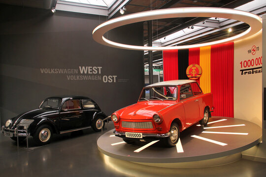 Zwickau, Germany - August 20, 2023: Volkswagen Beetle and the 1000000th Trabant, cars from Western and Eastern Germany. Located in August Horch museum in Zwickau.
