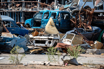 damaged and looted cars in a city in Ukraine during the war
