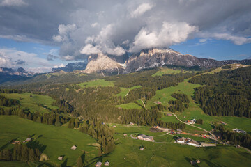 Fototapeta na wymiar Aerial view of Alpe di Siusi landscapes, Italy Dolomites in spring time