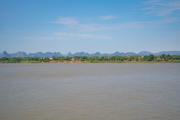 Aerial view of Mekong River with green mountain hill. Nature landscape background in Ubon Ratchathani, Thailand and Laos.