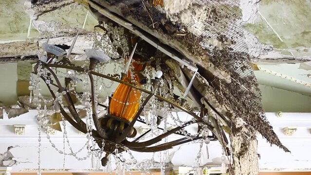 Broken chandelier, ruins inside the drama theater in Chernihiv after the attack of Russia