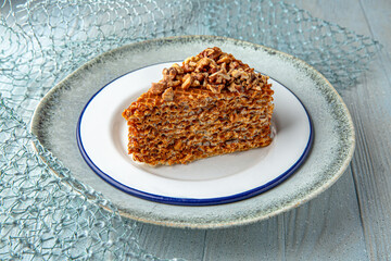 Wafer cake with boiled condensed milk on a blue background. Mediterranean Kitchen. Sea mood menu.