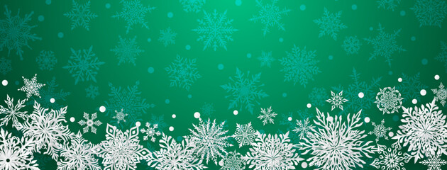 Christmas illustration with beautiful complex paper snowflakes, white on green background
