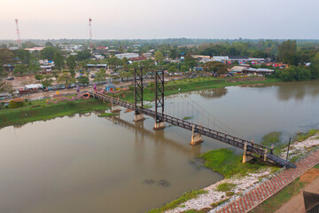 Aerial view of Bridge and Chao Phraya River in structure of suspension architecture concept, Urban city, Bangkok. Downtown area, Thailand.