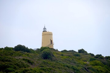 Fototapeta na wymiar View towards the the Faro Punta Carbonera lighthouse from La Alcaidesa, Mediterranean Sea, Costa del Sol, Andalusia, Malaga, Spain