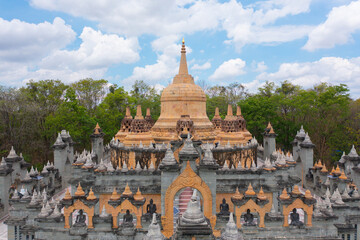 Wat Prachakom Wanaram (Wat Phakoong) temple pagoda is a buddhist temple in Roi et, an urban city town, Thailand. Thai architecture landscape background. Tourist attraction landmark.