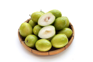 Green jujube fruits on white background.